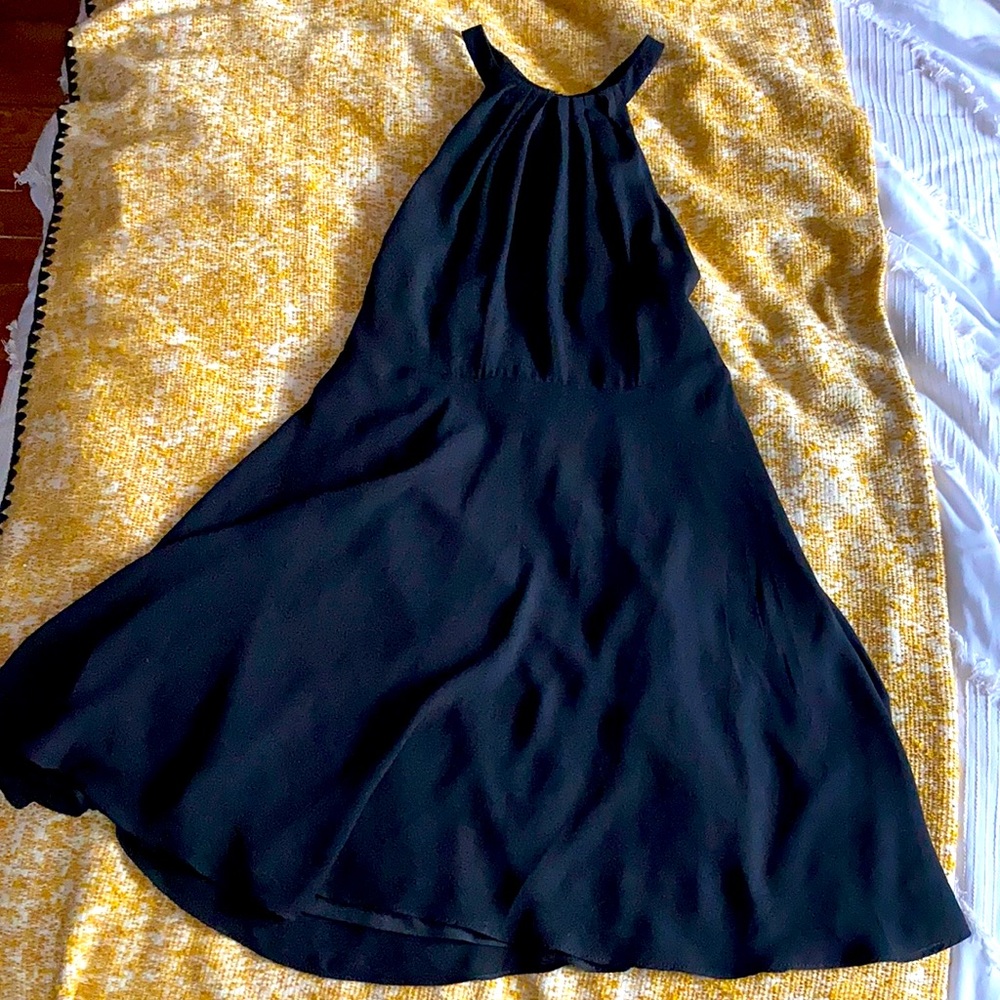 Express sleek black cocktail dress with slit on back